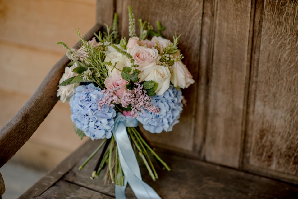 Wedding Bouquet on an old wooden bench